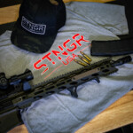 STNGR Patriot Shirt with Hat and gun